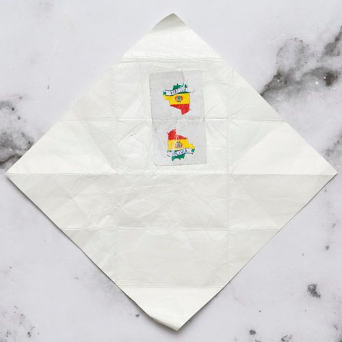 Gnome post Bolivia on marble