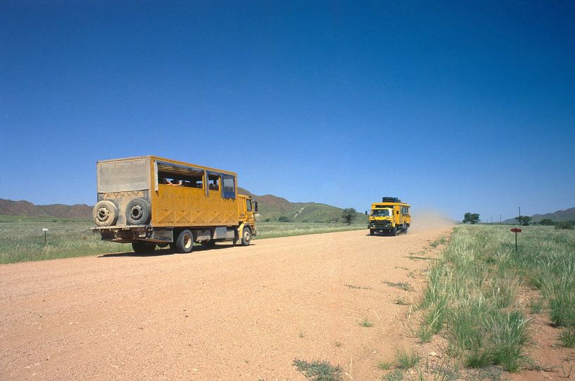 Overland trucks in the Naminib by Richard Wareham