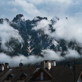 View from the city to the Dolomites with clouds by Jens Seßler
