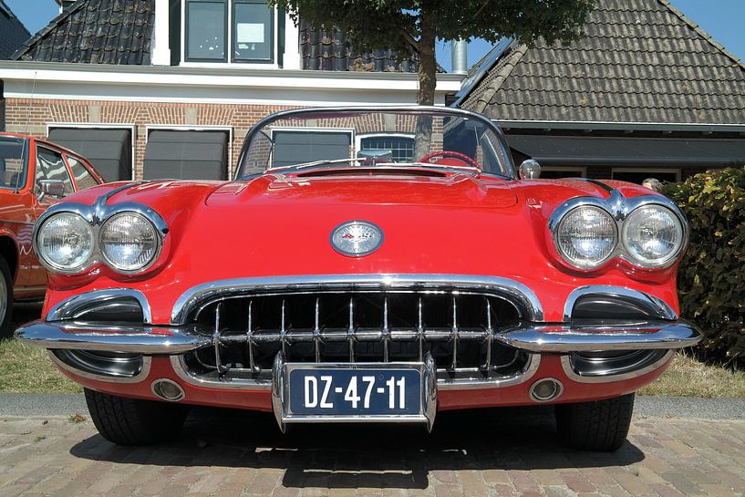red chevrolet corvette in tzummarum at an oldtimers' day by Double u photography