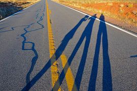 Shadow on the road. by Alexandre Tziripouloff