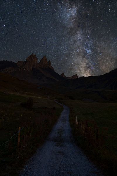 Milky way and stars above the mountains of the French Alps. by Jos Pannekoek