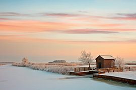 Water pumping station in winter setting by Peter Bolman