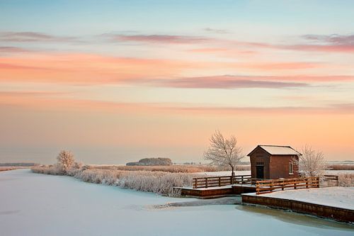 Water pumping station in winter setting