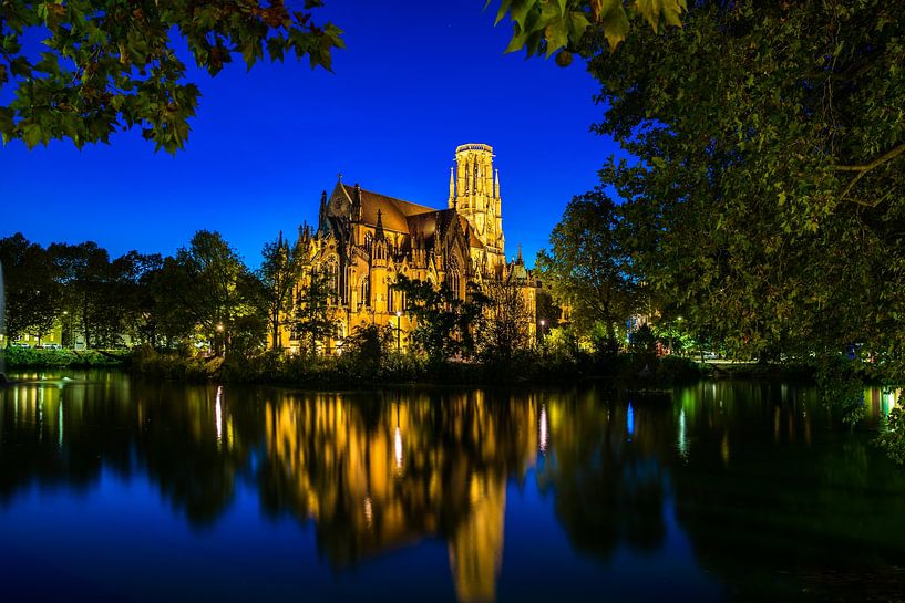 Germany, Illuminated church reflecting in water in downtown stuttgart city by adventure-photos