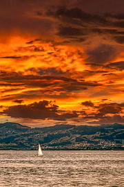 Sailing boat with storm clouds over Lake Constance by Dieter Walther
