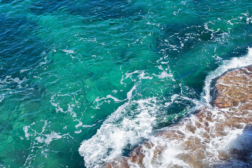 Clear seawater flows over the rocks 3 by Adriana Mueller