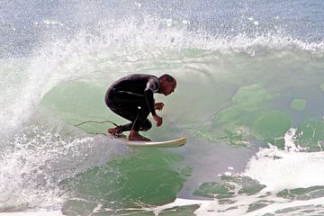 Surfer surfing the wave by Eye on You