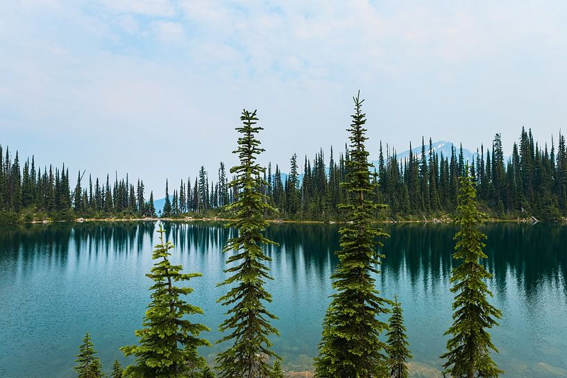 A quiet mountain lake in Revelstoke National Park by laficoco