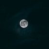 Full moon in the dark sky by Robin van Steen