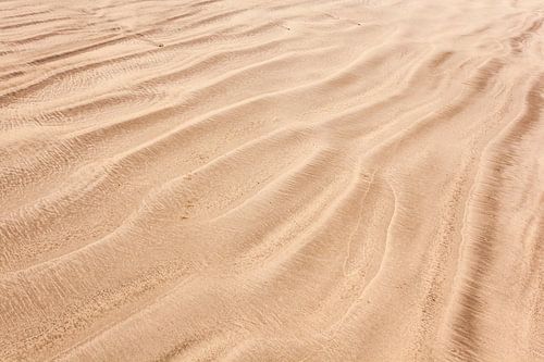 Zand tussen je tenen