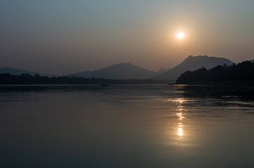 Zonsondergang op de Mekong