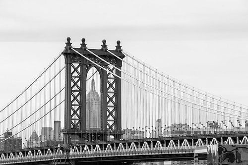 Manhattan Bridge, New York, with the Empire State Building on background