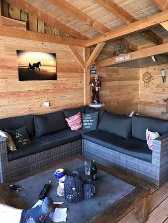 Pferd und Sulky am Strand