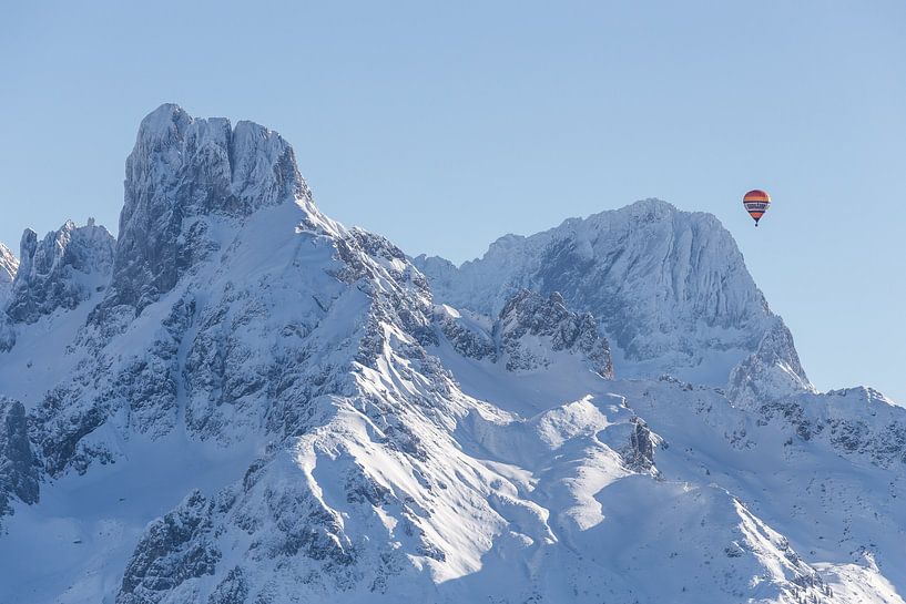 Winter mountains and a hot air balloon by Coen Weesjes