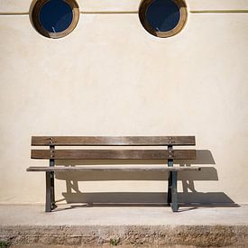 Bench with two round windows resembling a face by Studio Zwartlicht