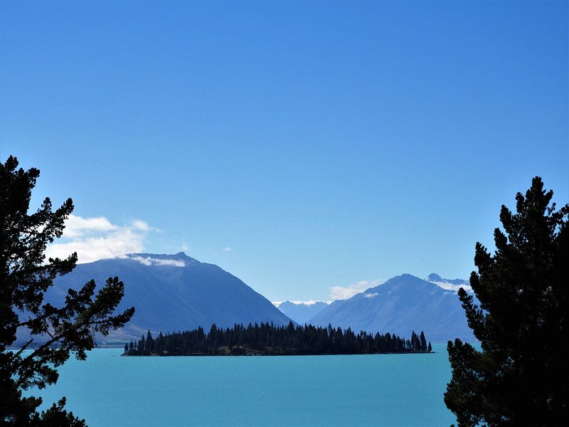 The blue colors of Lake Tekapo, New Zealand by J V