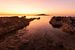 Het verre eiland bij zonsondergang van Fabrizio Micciche