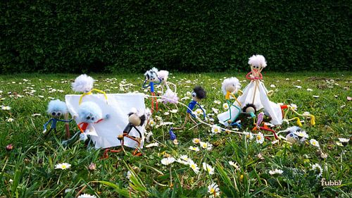 Funny Fubby dolls camping and setting up tents.