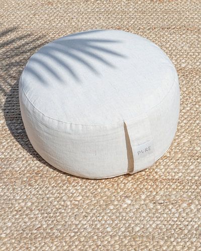 Calm meditation cushion with a palm leaf design