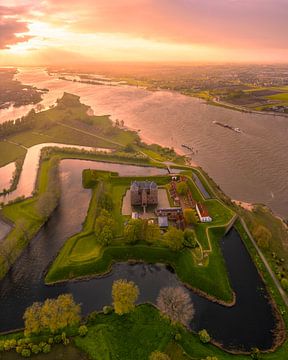 Loevestein Castle at sunset by Ewold Kooistra