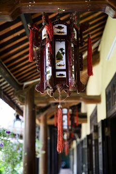 Lantern corridor in a pagoda by Frank Photos