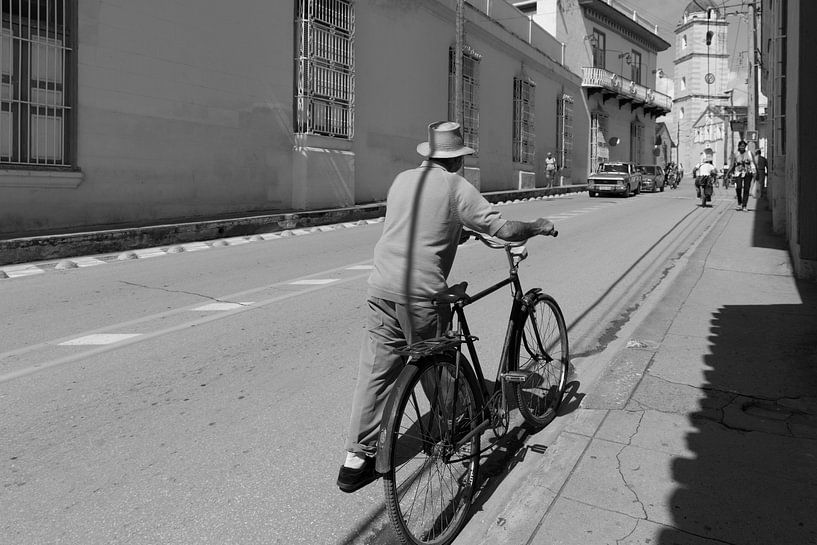Man with bicycle by Dusty Bisschops