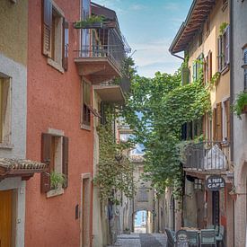 Coloured street on Lake Garda by Karin vd Waal