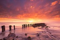 Zonsondergang boven de Waddenzee bij eb van Bas Meelker thumbnail