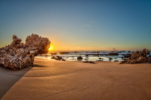 Zonsondergang op het strand