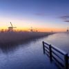 Sunrise at the windmills in Kinderdijk by Rene Siebring