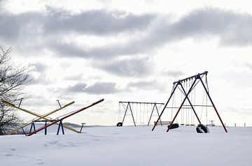 The playground in winter by Claude Laprise