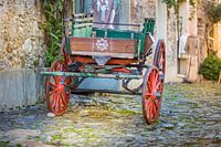 Abandoned Carriage on cobblestones