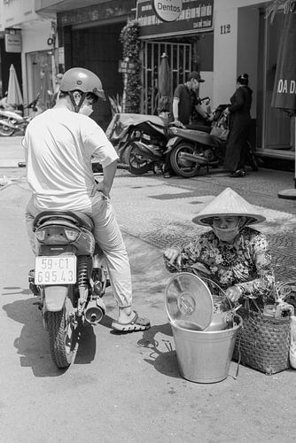 Verkäuferin auf der Straße in Ho-Chi-Minh-Stadt