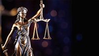 Bronze figure of a judge by Mustafa Kurnaz thumbnail