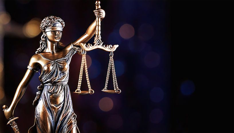 Bronze figure of a judge by Mustafa Kurnaz