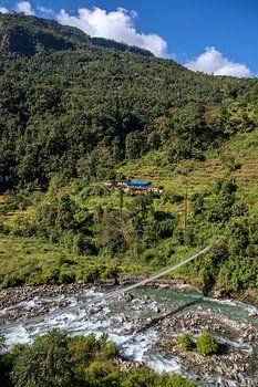 Suspension bridge in the mountains.