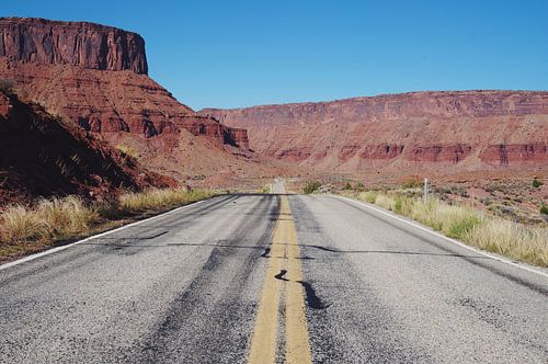 Typical American Road Trip, road with breathtaking Canyon scenery in Utah