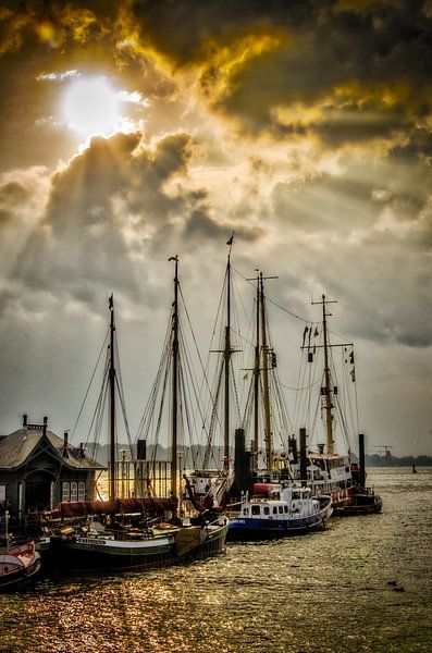 Ships in the museum harbour Övelgönne Hamburg and clouds against the light by Dieter Walther