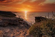 Kleurrijke zonsondergang aan de kust van Christian Klös thumbnail