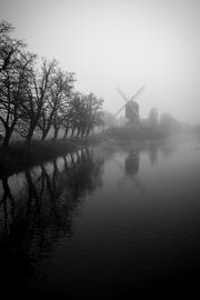misty morning with a windmill by Bart Liesenborgs