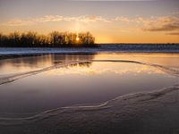 Sunset at a frozen pond