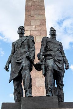 Geroicheskim Zashchitnikam Leningrada monument withStand statues of Russian young worker and young R by WorldWidePhotoWeb