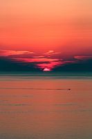 Zonsondergang op zee