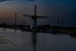 De Kortlandse Molen bij Avondlicht van Kees Goethart