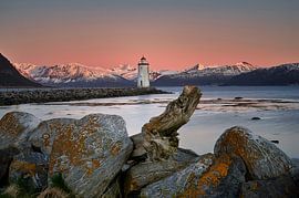 The old log and the lighthouse, Godøy, Norway by qtx