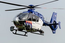 Dutch police helicopter in flight by John Wiersma