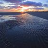 Sonnenuntergang am Strand von Antwan Janssen