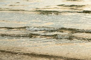 waves in the sea with a golden glow on Ameland by Karijn | Fine art Natuur en Reis Fotografie