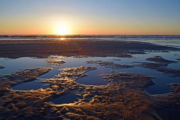 Zonsondergang op Texel van Nederland op Foto